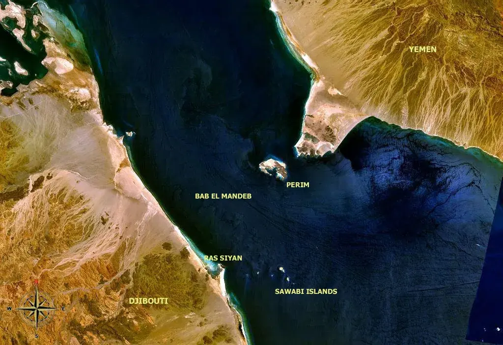 Cargo ships transiting the Bab al-Mandeb Strait between the Red Sea and the Gulf of Aden