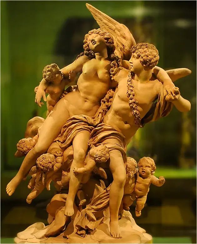 A classical sculpture depicting Cupid and Psyche embracing
