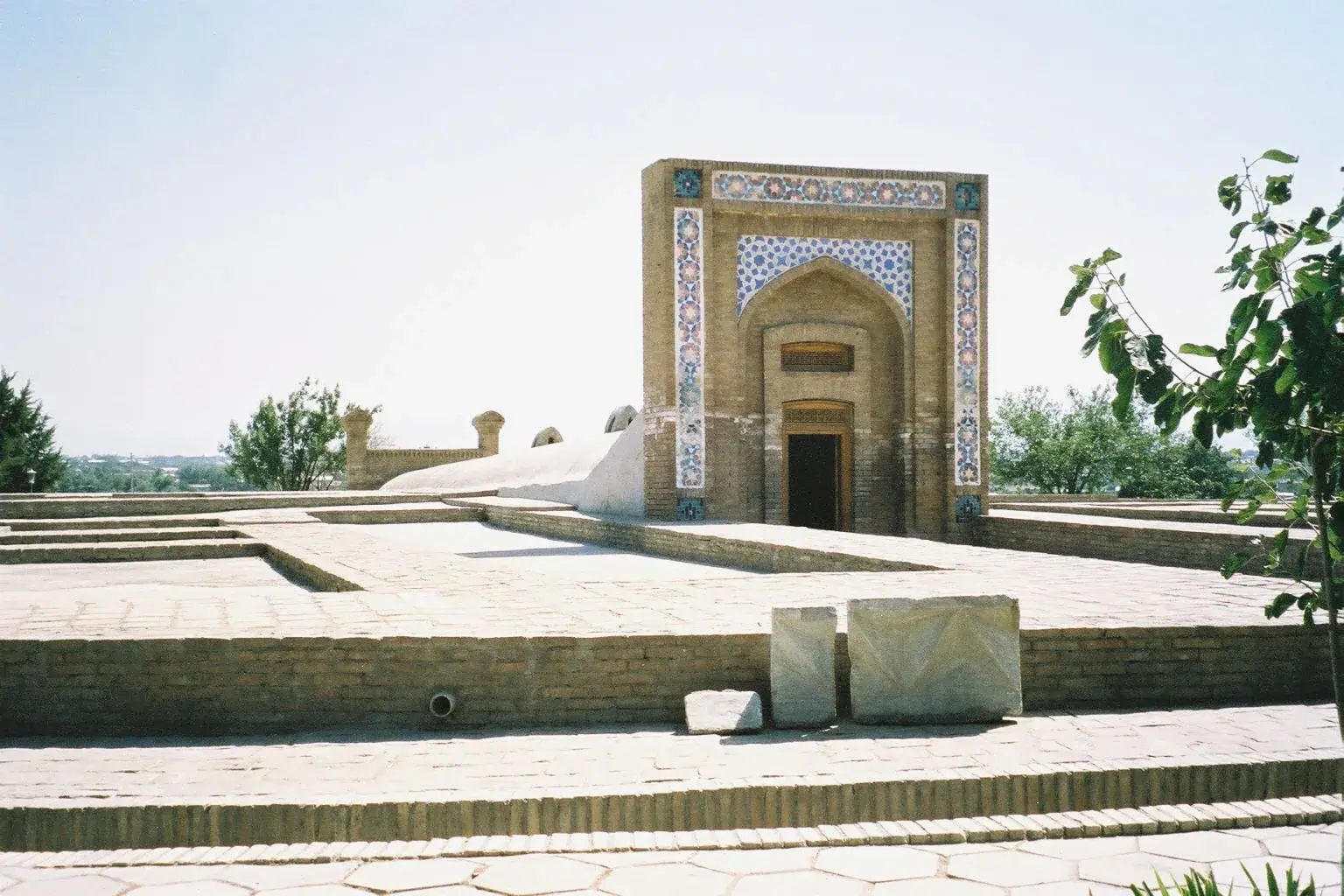 Sun-baked mudbrick and turquoise-tiled architecture typical of the Silk Road cities of Central Asia near Samarkand