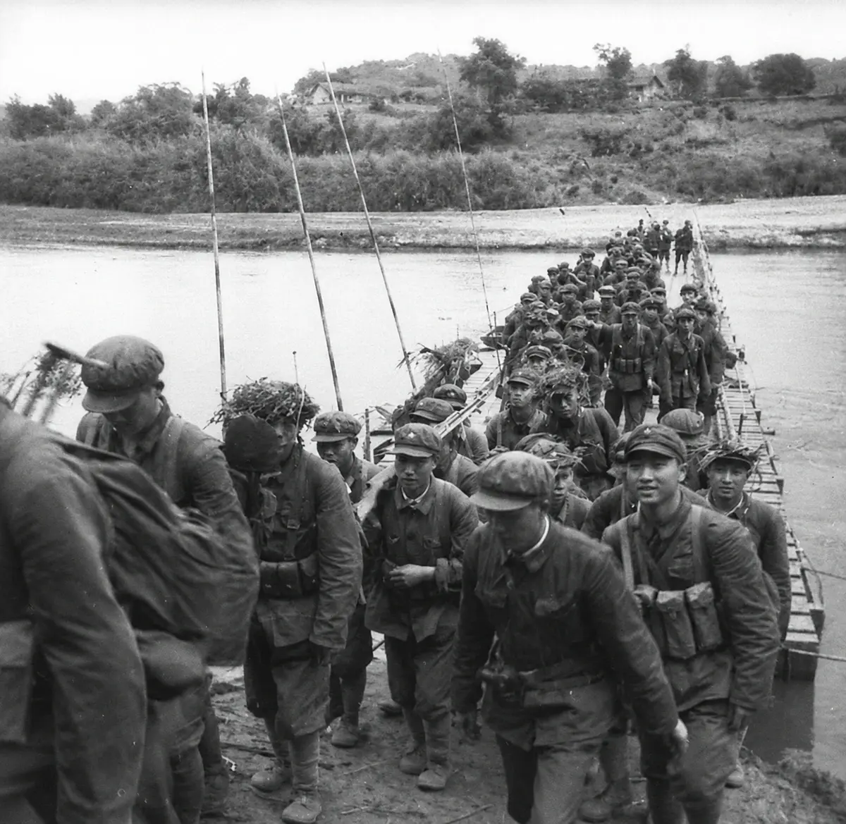 Ethnic Chinese refugees crossing the land border from Vietnam into Guangxi, China, in the late 1970s