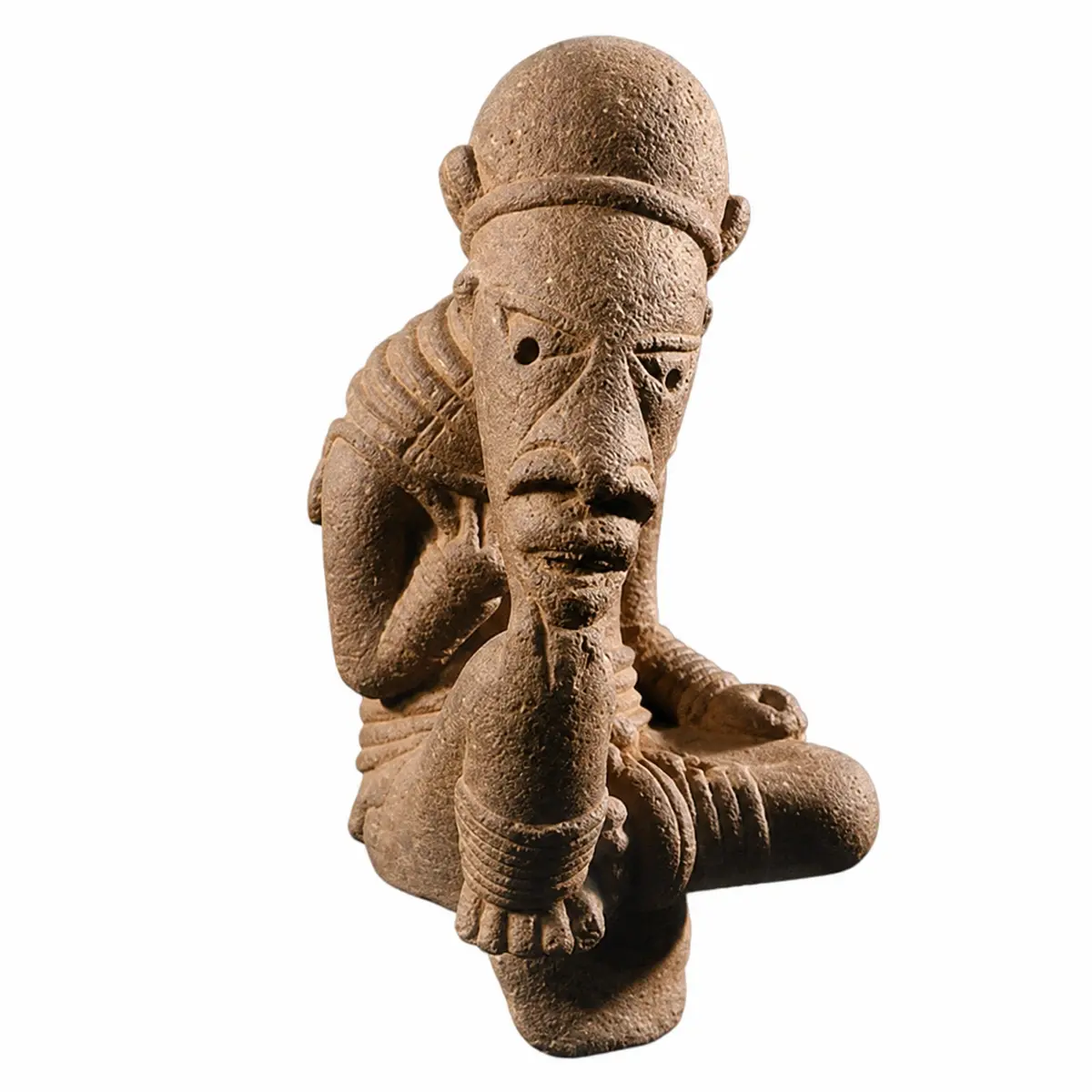 Seated Nok terracotta figure with one arm resting on a raised knee, on a pot-shaped base