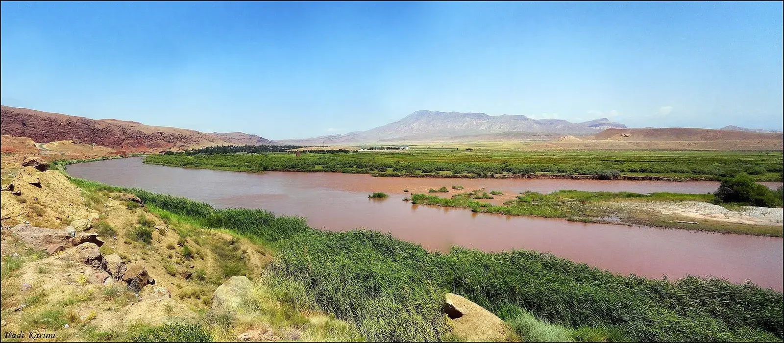 The Aras River winding through a mountainous valley along the Iran-Azerbaijan border