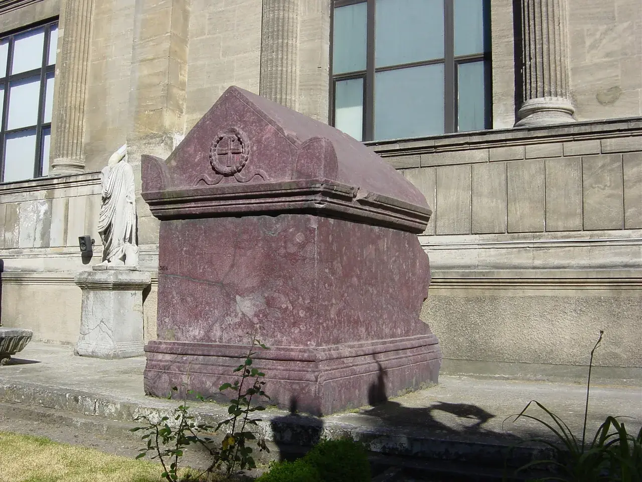 A deep purple-red porphyry sarcophagus of the kind used to bury Roman emperors
