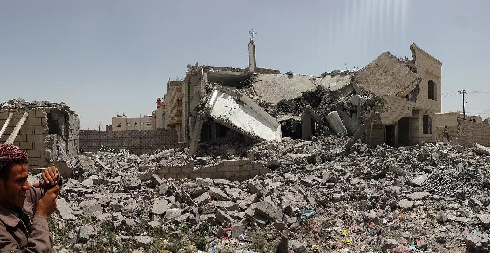 Rubble from a Saudi-led coalition airstrike on a residential area in Yemen